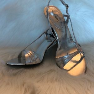Nine W. Silver evening sandals.